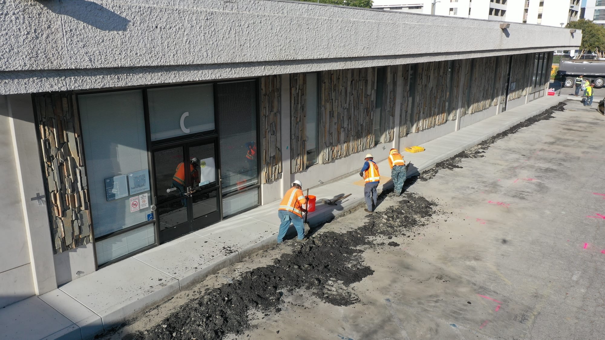 before photo showing worn pavement or entrance areas