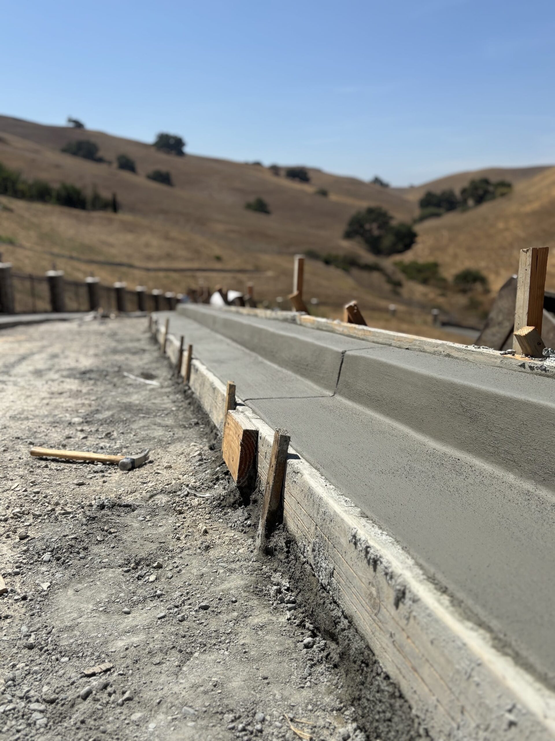 close-up of the finished hand-troweled curb profile