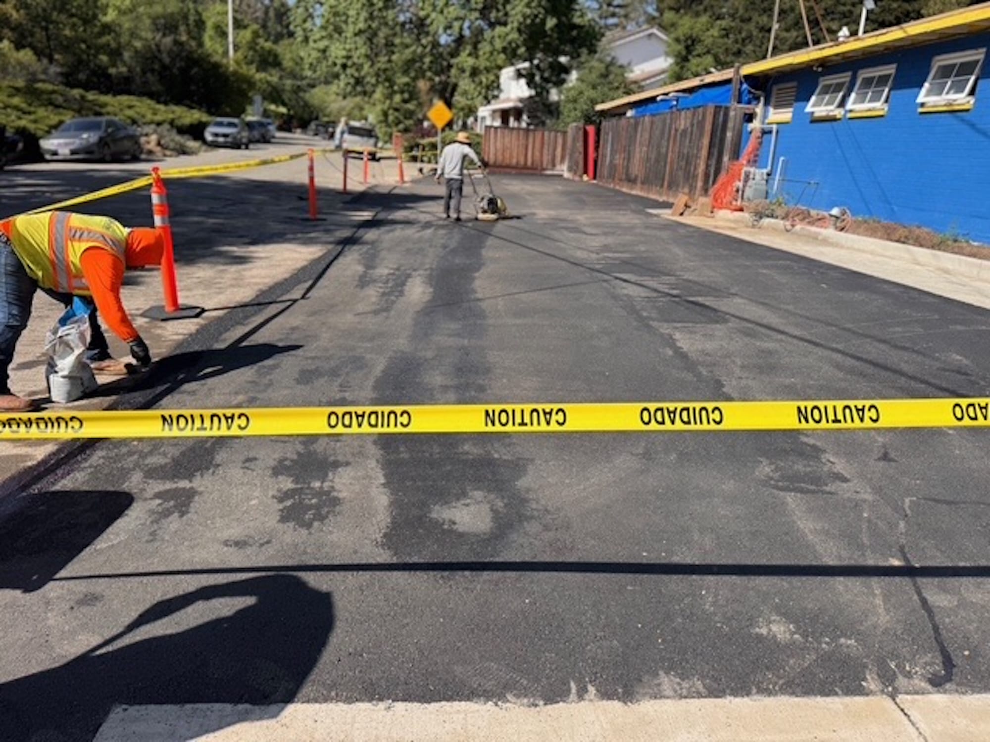 crew performing crack sealing or patch repairs