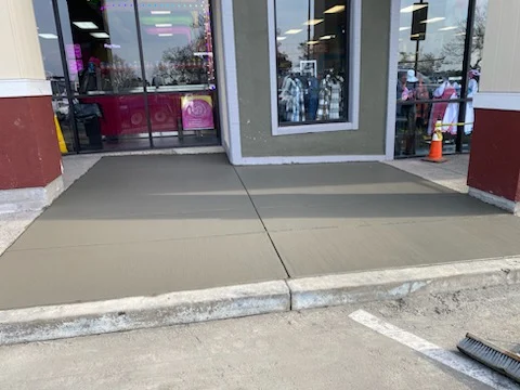 crew and paver laying hot mix asphalt