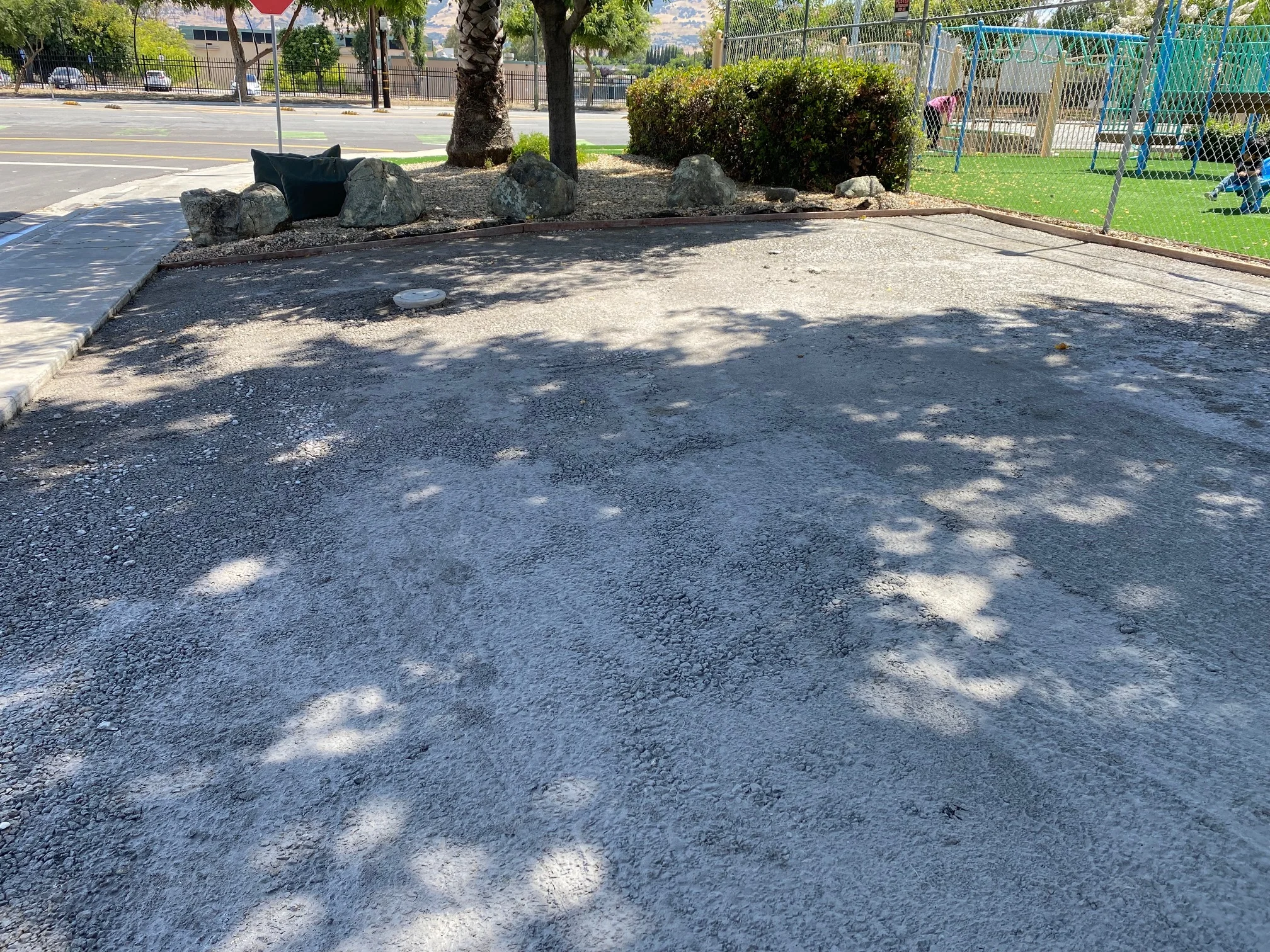 before photo showing cracked/faded pavement